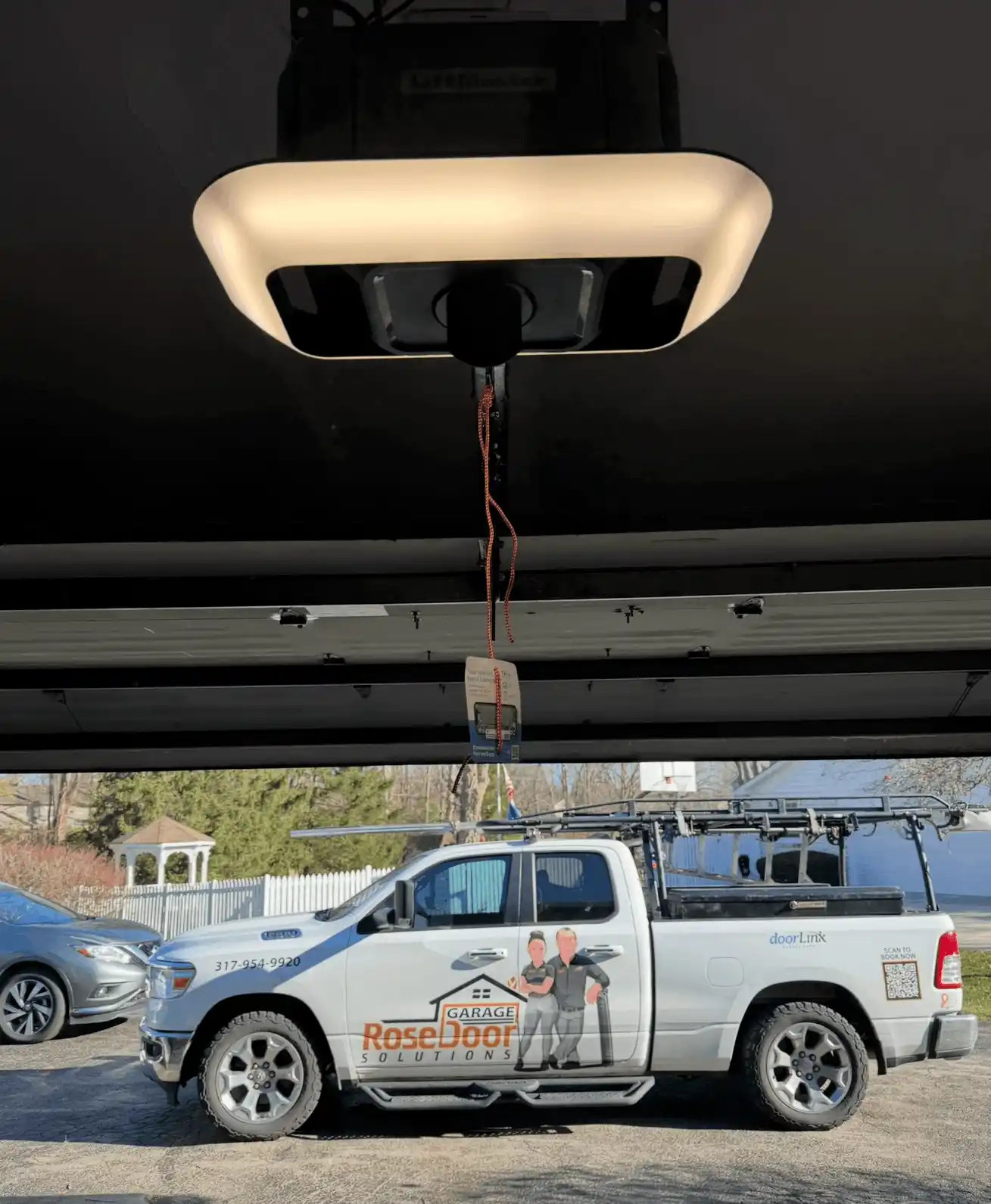 LiftMaster garage door opener mounted on ceiling in Carmel, IN