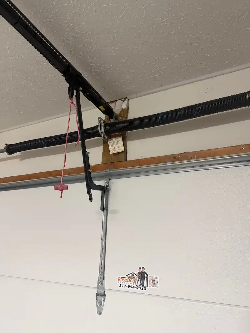 Garage door torsion spring and hardware inspected during a same day repair in Carmel, IN